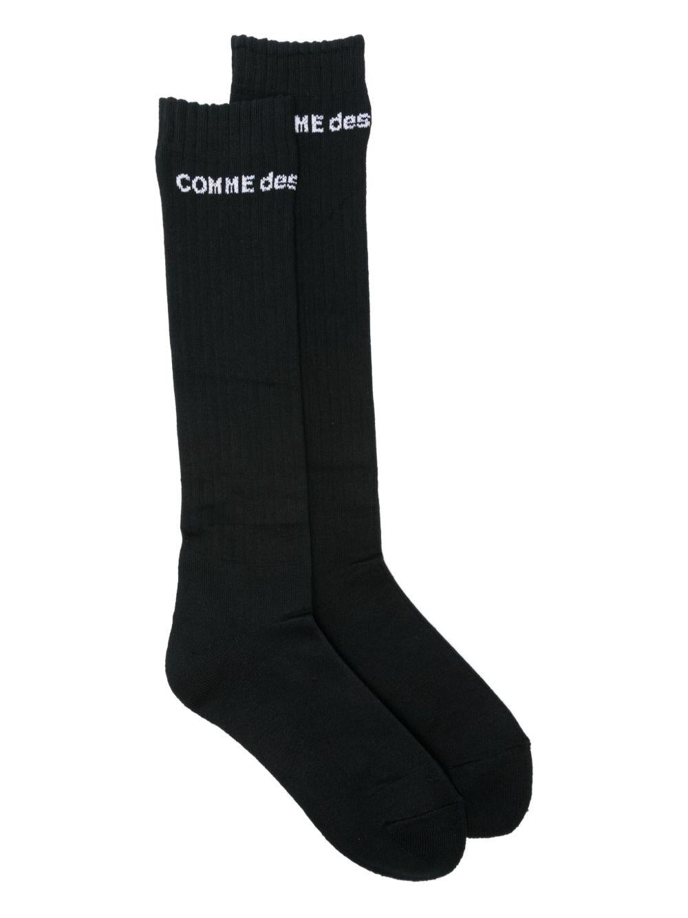 Calzini alti con logo in nero  Comme des garcons homme plus - uomo<BR/> 
