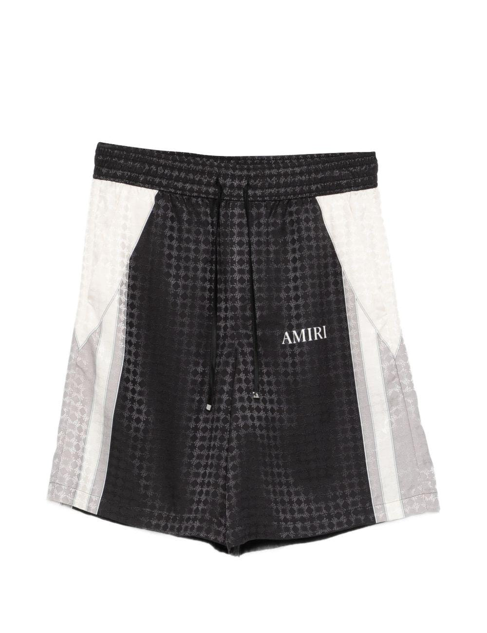 Pantaloncini con coulisse a quadri in nero Amiri - uomo 