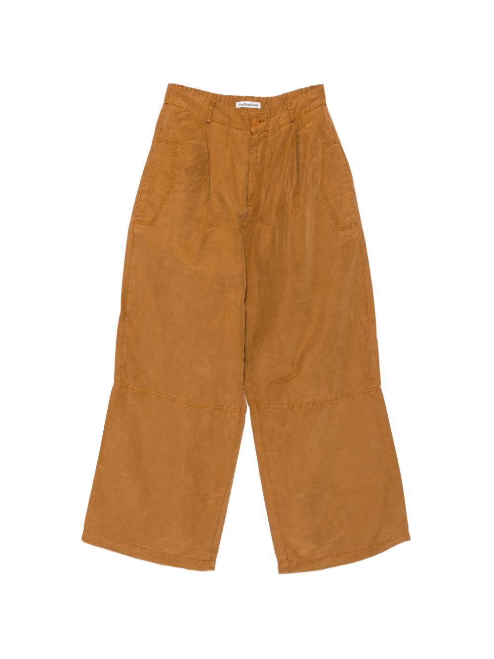Pantaloni a gamba larga con pieghe in arancione Ymc - uomo 