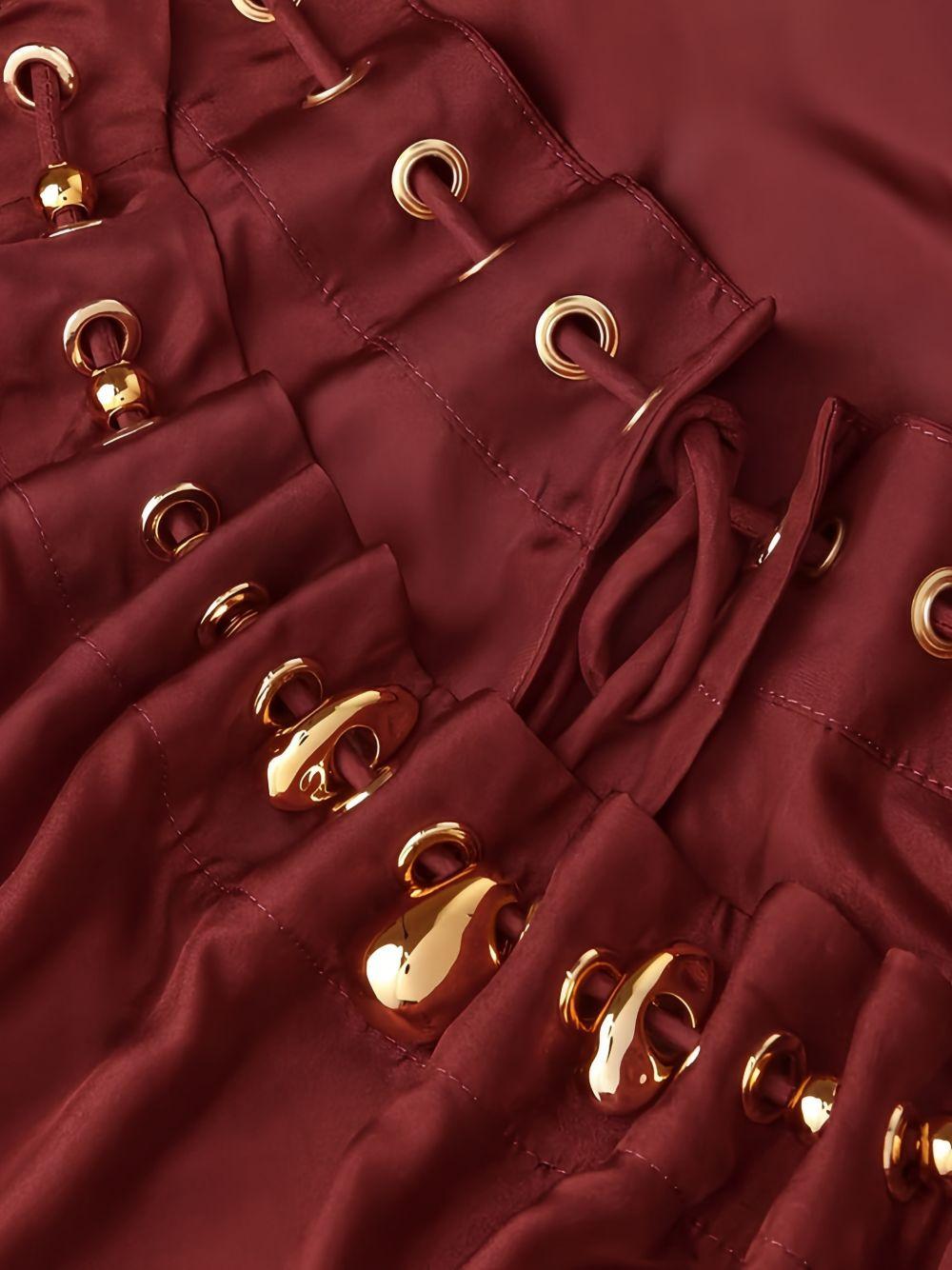 Blusa con decorazioni di perline Aster in bordeaux 