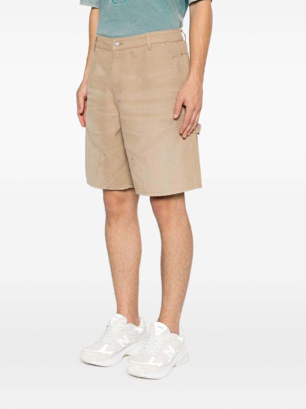 Short con design a pannelli in beige Represent - uomo 