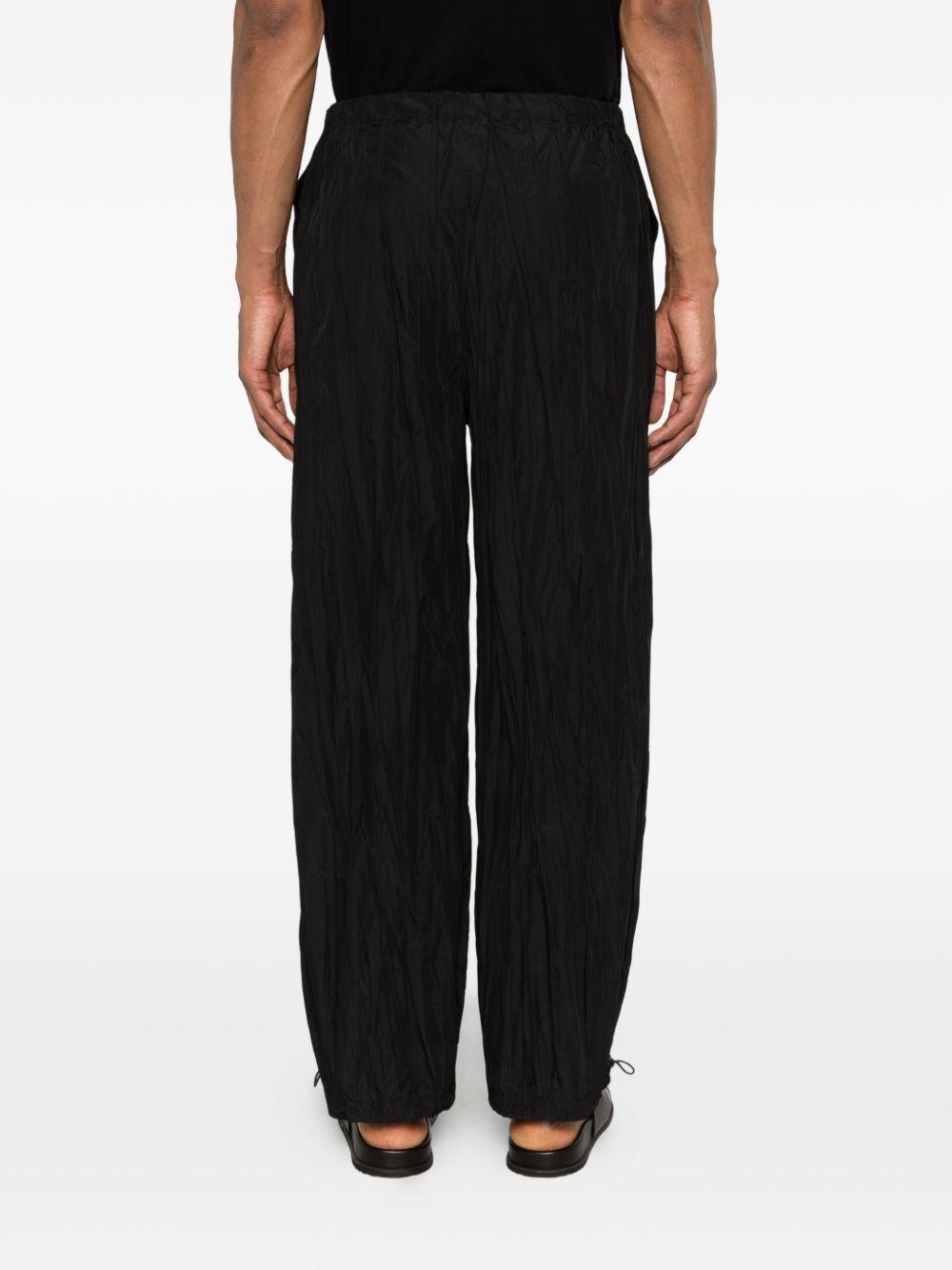 pantaloni plissettati in nero gongdid design - uomo 
