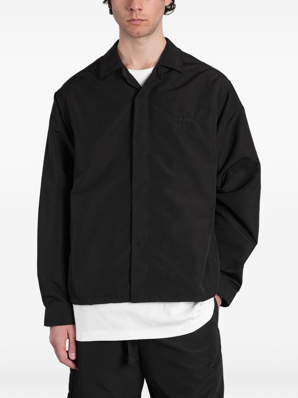 Camicia con stampa grafica in nero Oamc peacemaker - uomo 