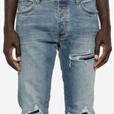 Jeans con strappi in blu 
