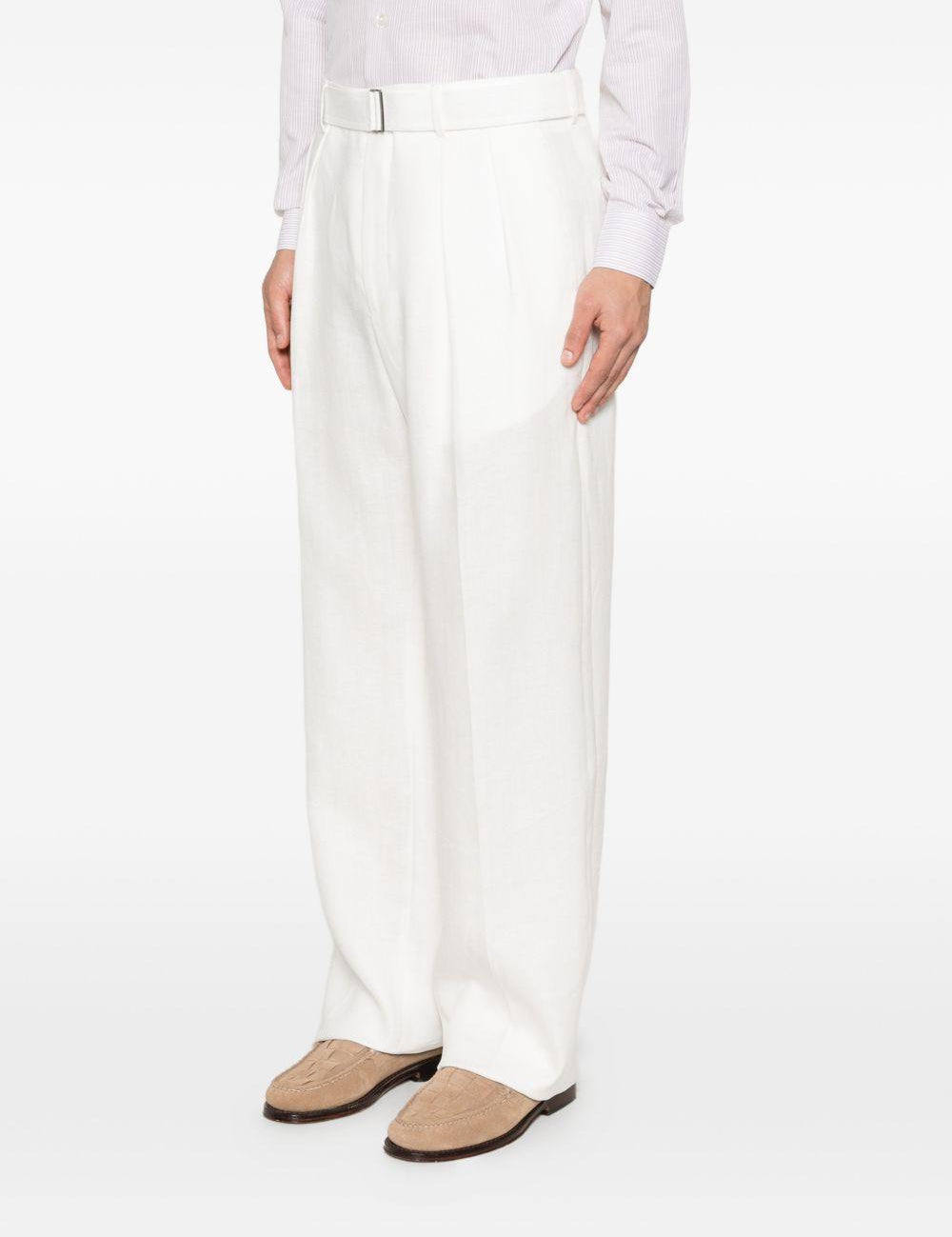 Pantaloni con cintura e dettagli a pieghe in bianco Tagliatore - uomo 