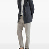 Jeans a cinque tasche con chiusura a bottone in grigio Brunello cucinelli - uomo 