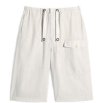 Shorts con tasca cargo in beige Lemaire - uomo 