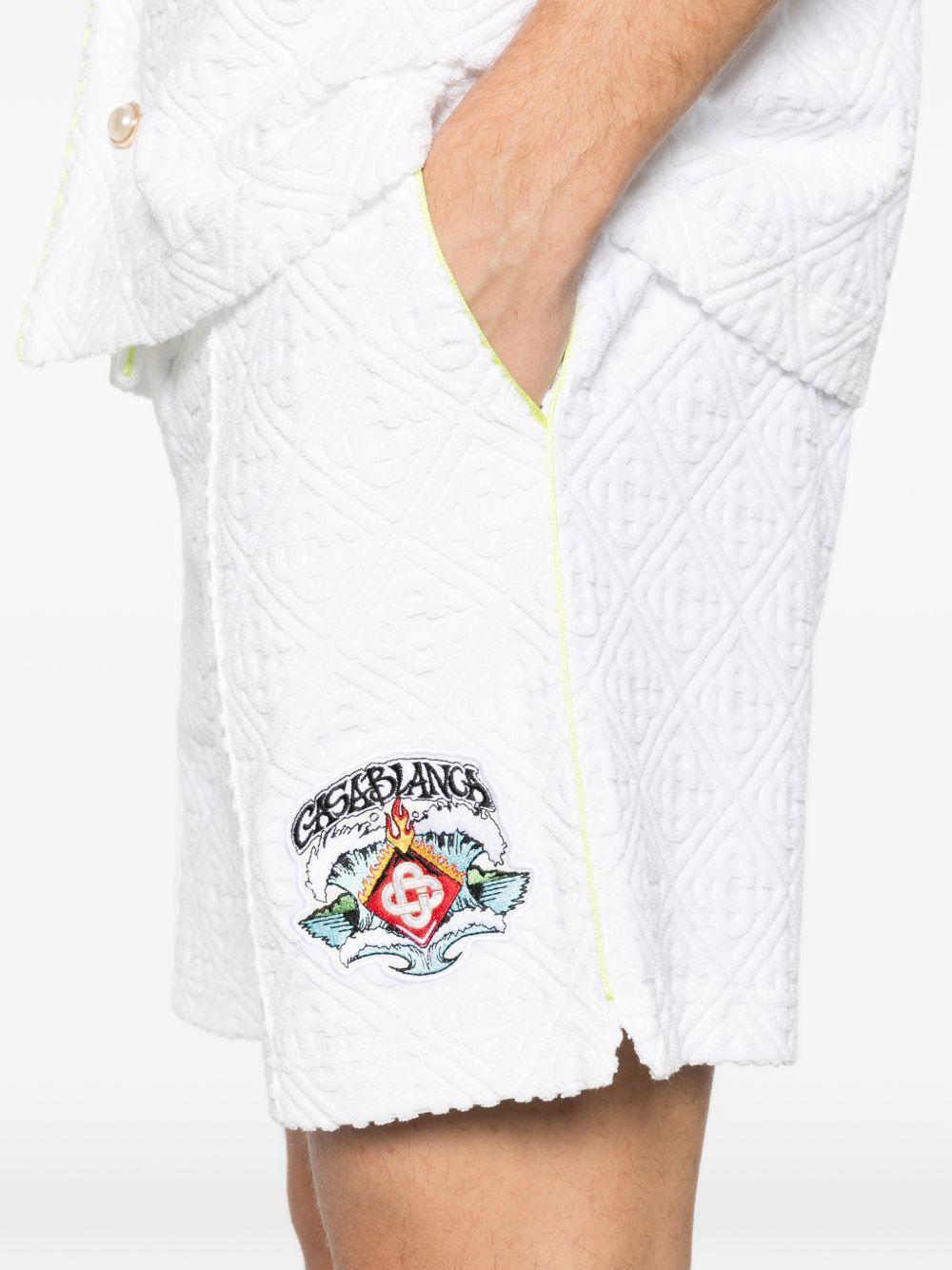 Shorts con monogramma in bianco Casablanca - uomo 