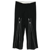 Pantaloni con zip in nero Comme des Garçons Homme Plus - uomo 