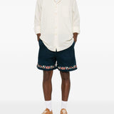 Shorts in twill con ricami floreali in blu Found - uomo 