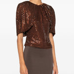 Top arricciato decorato con paillettes 
