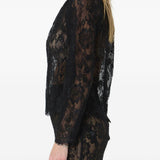 Blusa in pizzo in nero 