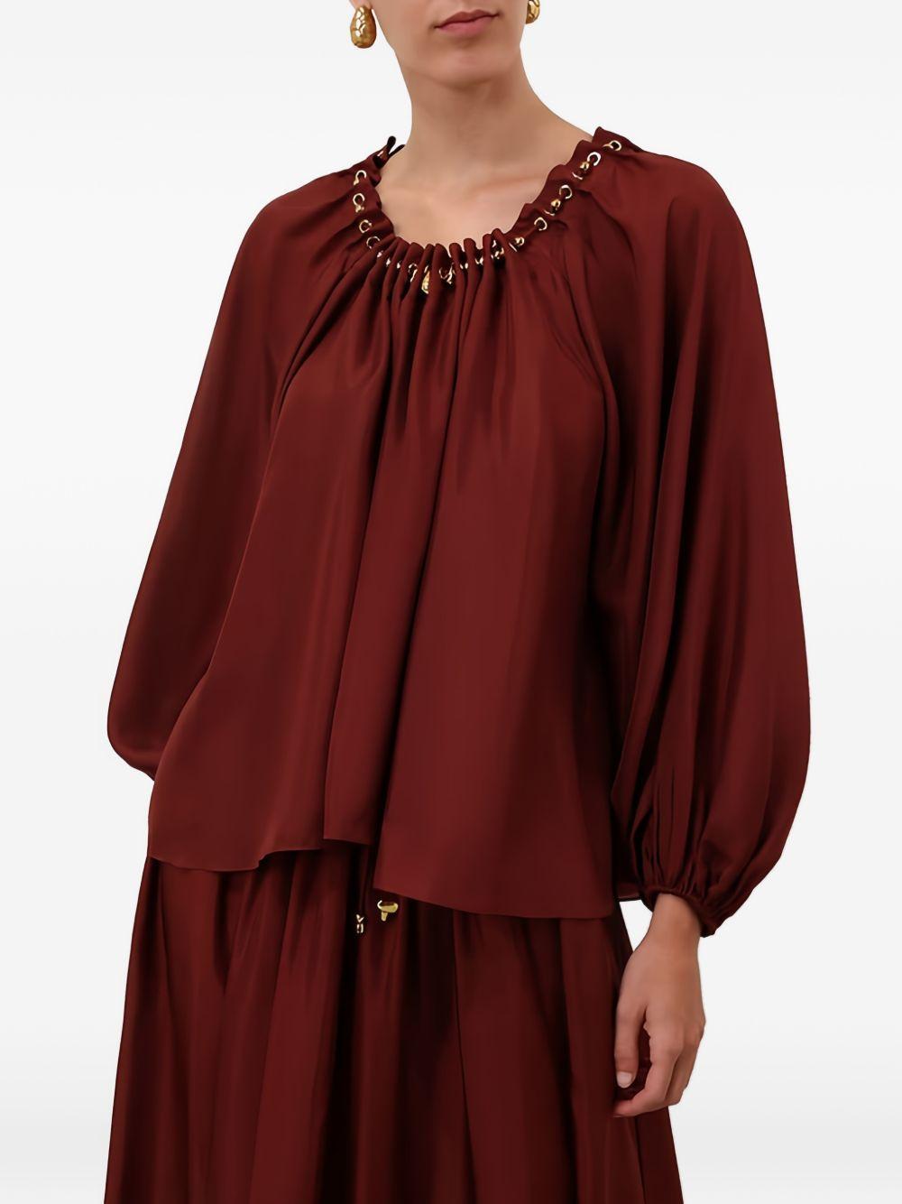 Blusa con decorazioni di perline Aster in bordeaux 