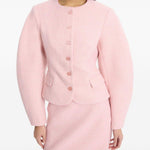 Gonna mini boucle in rosa 
