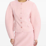 Gonna mini boucle in rosa 