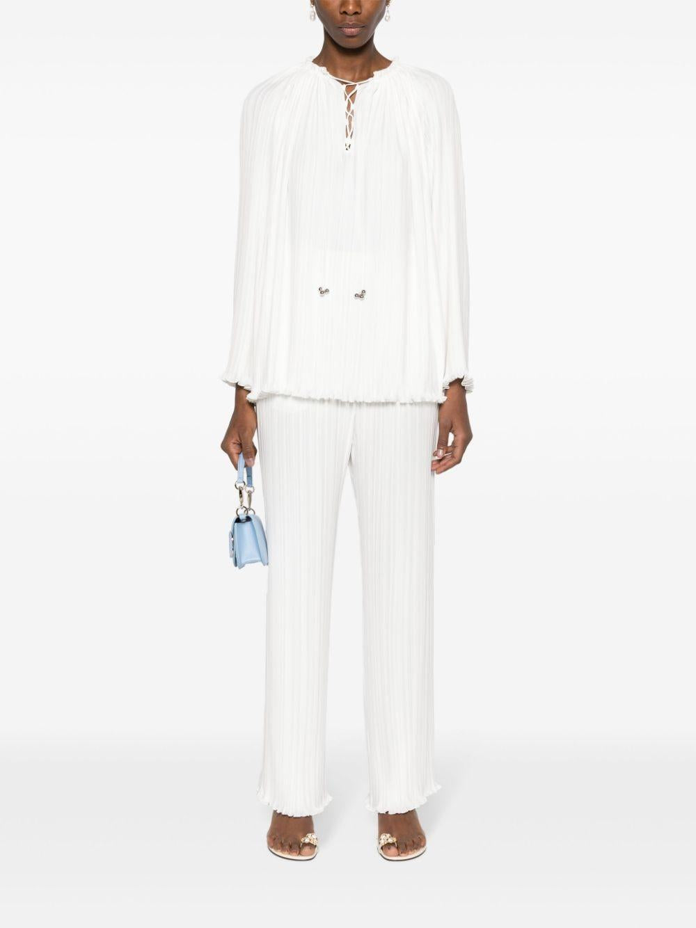 Pantaloni dritti con pieghe in bianco - donna 