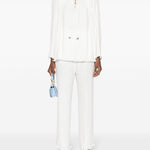 Pantaloni dritti con pieghe in bianco - donna 