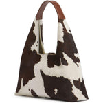 Borsa a spalla con stampa mucca Trapeze in bianco e marrone 
