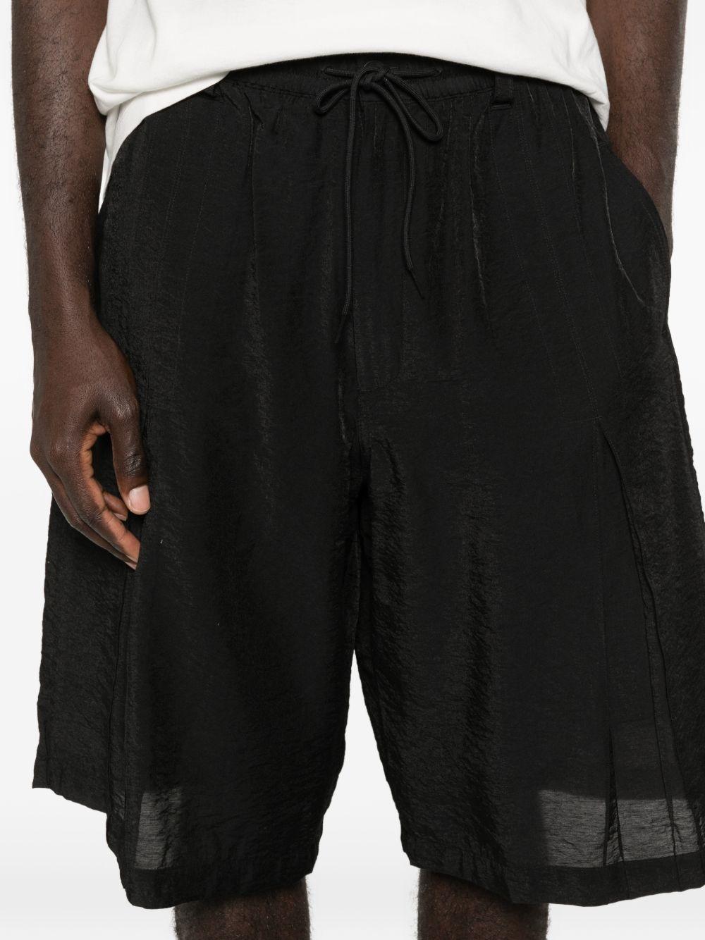 Pantaloncini con coulisse e pieghe in neroY-3 - uomo 