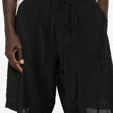 Pantaloncini con coulisse e pieghe in neroY-3 - uomo 