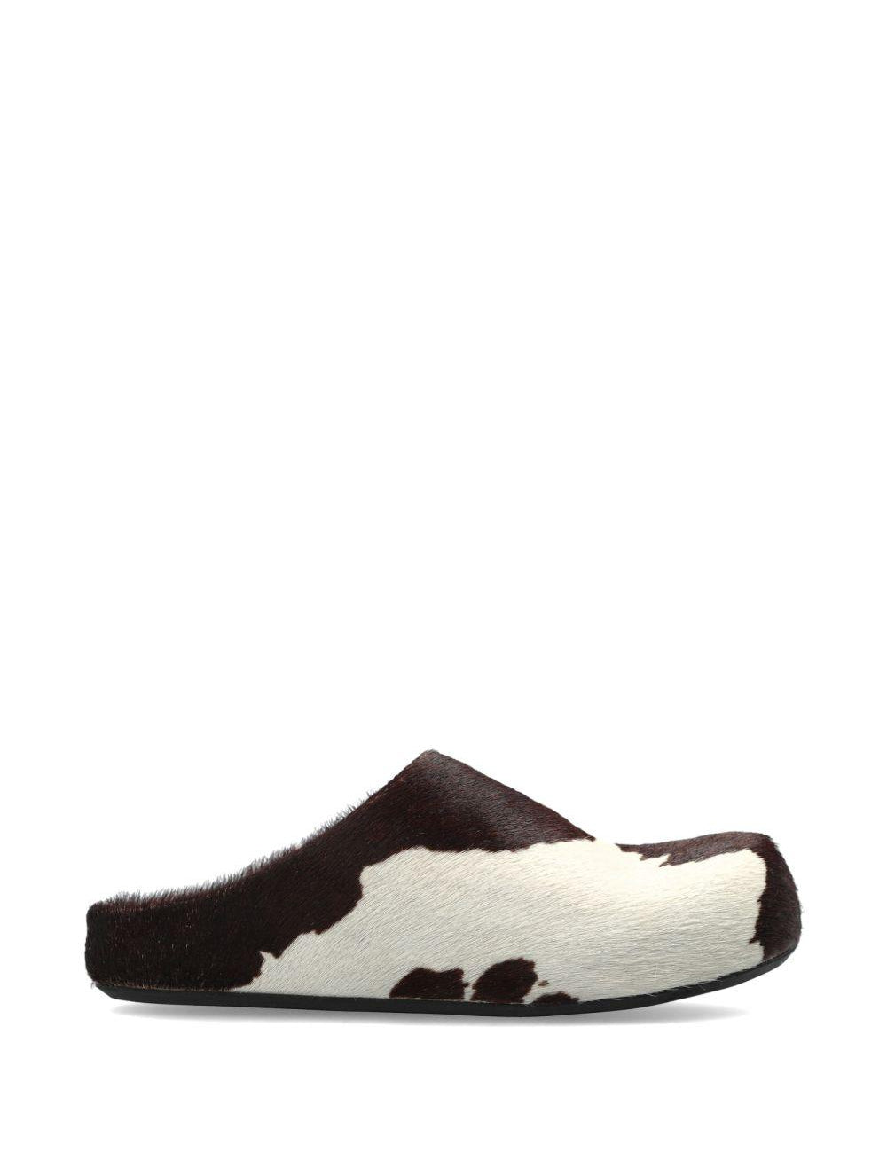 Mules fussbett con stampa mucca in bianco e marrone 