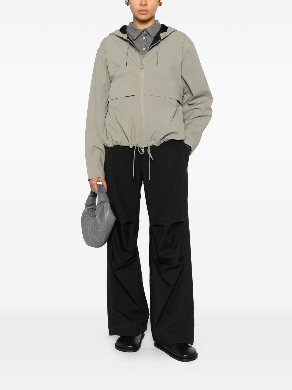 Giacca con cappuccio e zip in grigio Rains - donna 