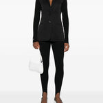 Leggings con staffe in nero Coperni - donna 