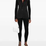 Leggings con staffe in nero Coperni - donna 