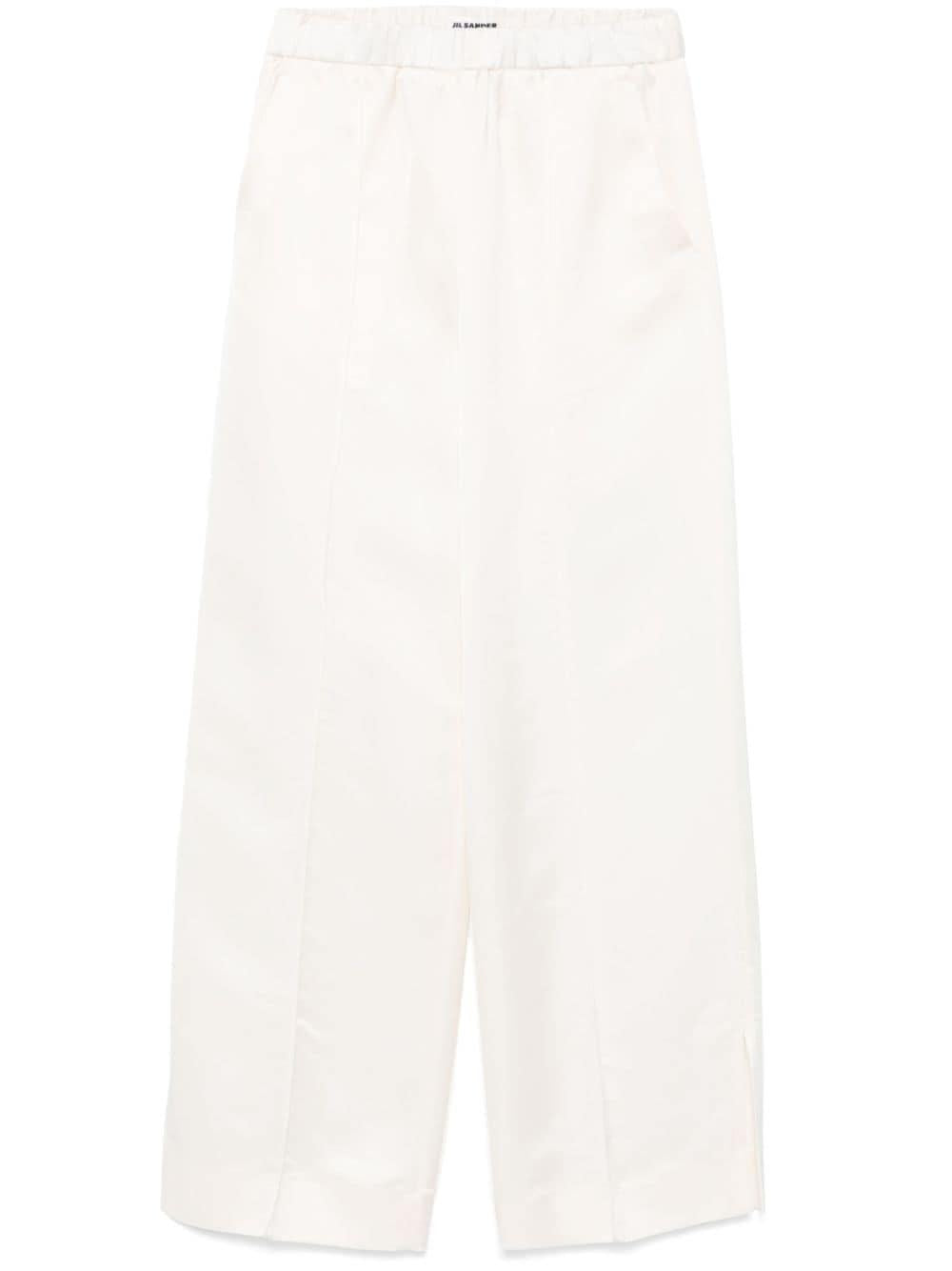 Pantaloni in raso in bianco Jil sander - donna 