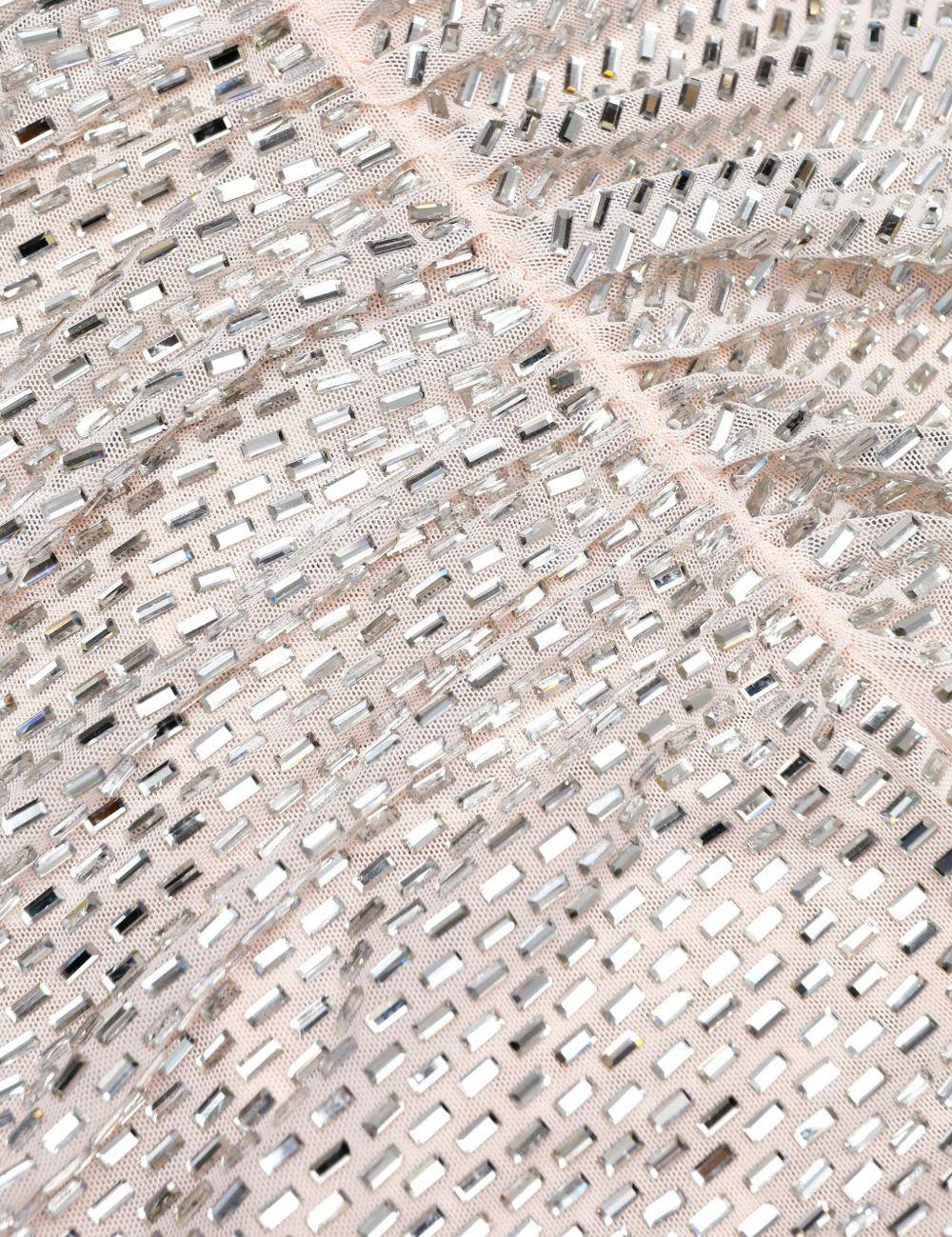 Miniabito decorato con strass in beige 