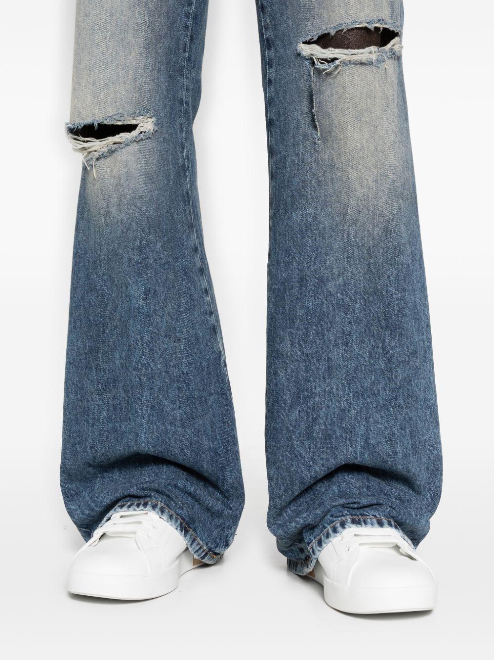 Jeans bootcut in blu Amiri - uomo 