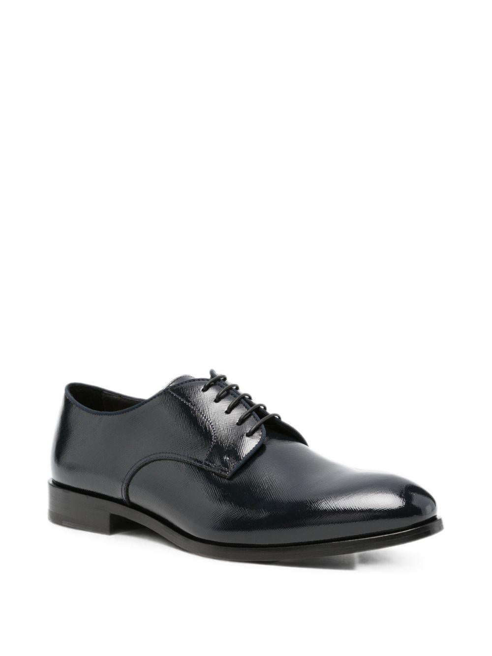 Derby in pelle in nero 