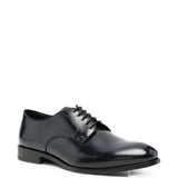 Derby in pelle in nero 