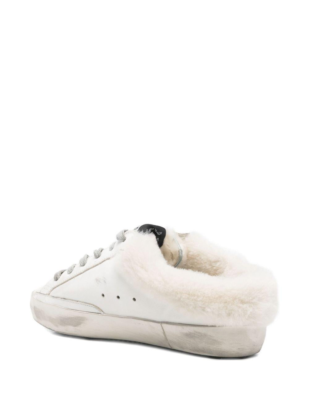 Mules con shearling super star in bianco 