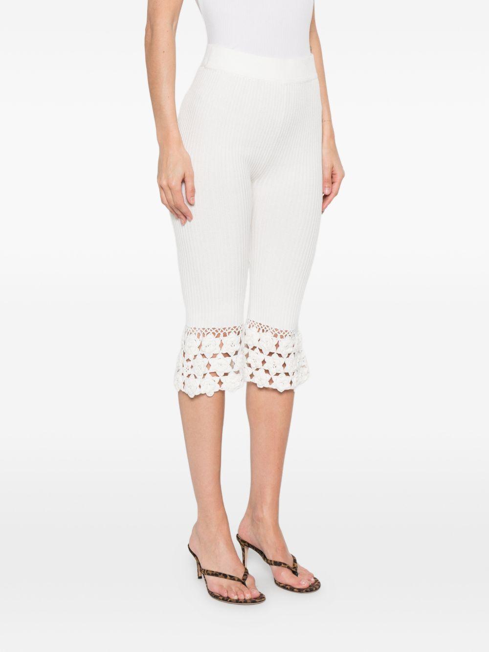 Pantaloni a coste con dettaglio all'uncinetto in bianco Ganni - donna 