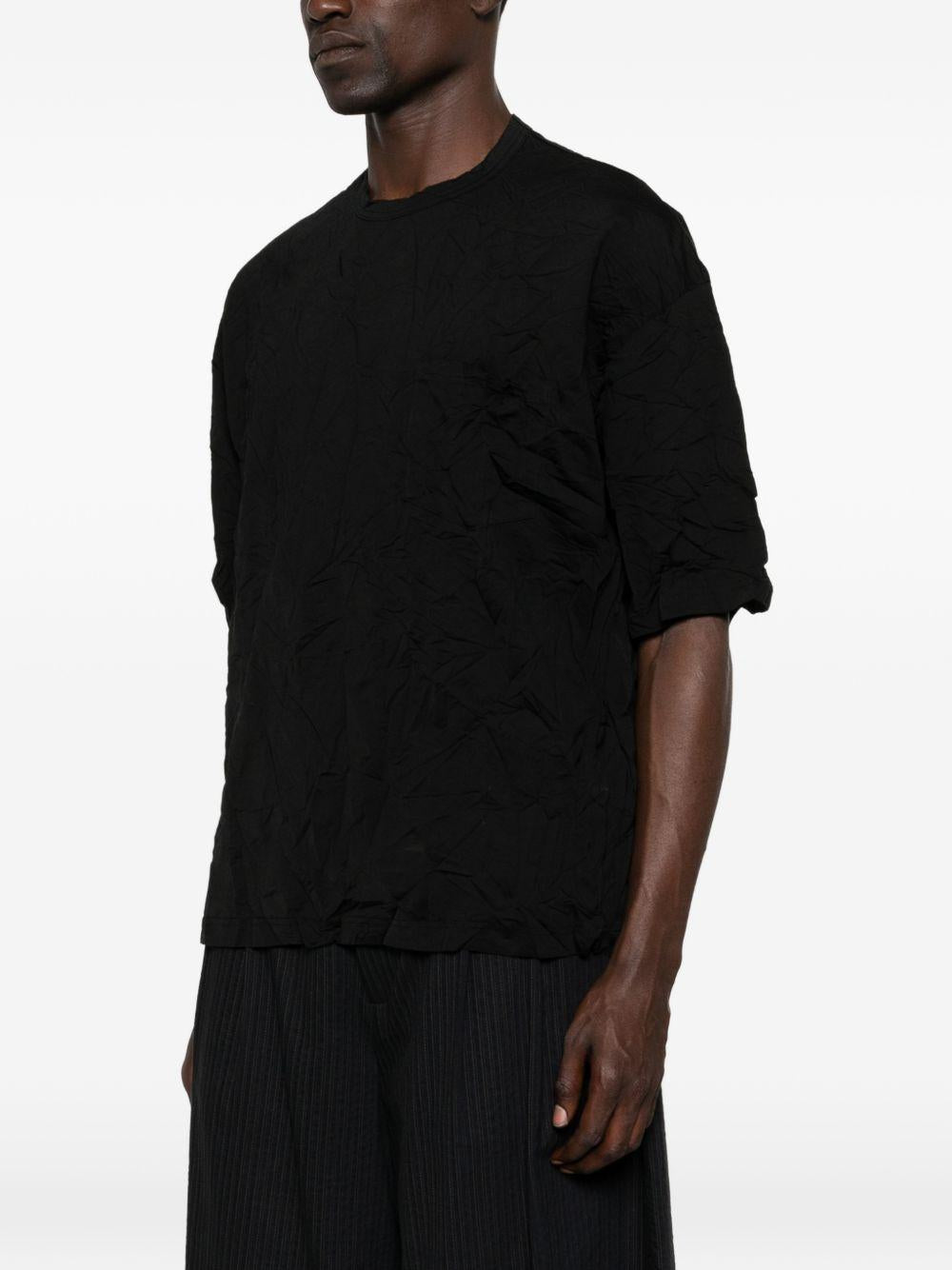 T-shirt con tasca sul petto in nero Comme des garcons homme - uomo 