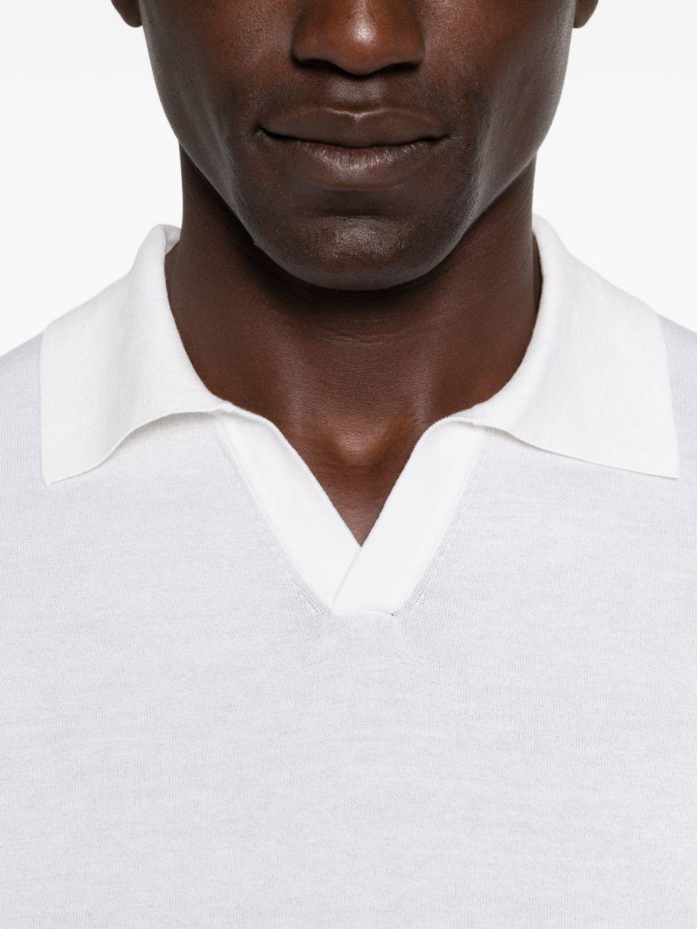 T-shirt a maglia fine con scollo a v in bianco Simkhai - uomo 