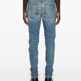 Jeans con strappi in blu 