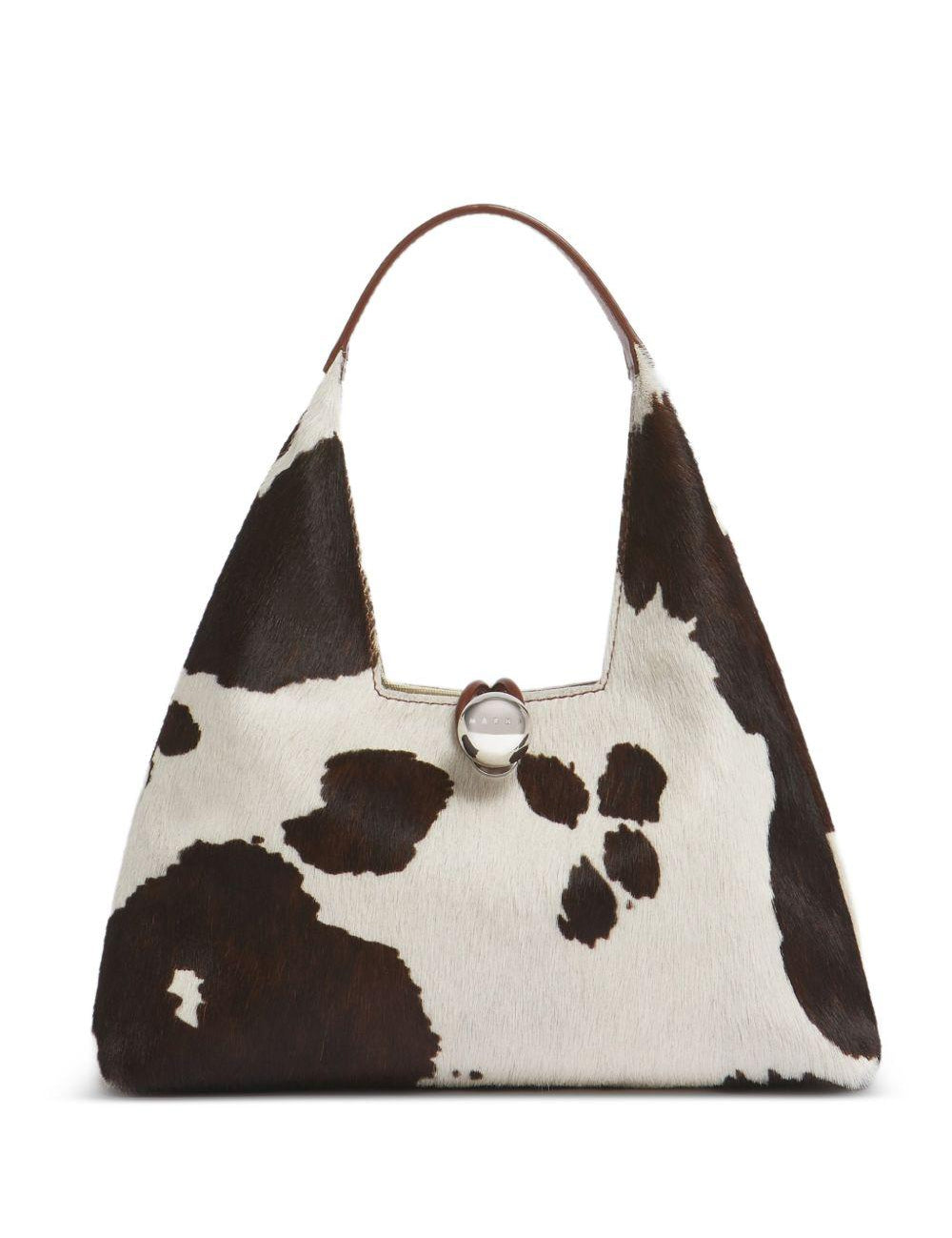 Borsa a spalla con stampa mucca Trapeze in bianco e marrone 