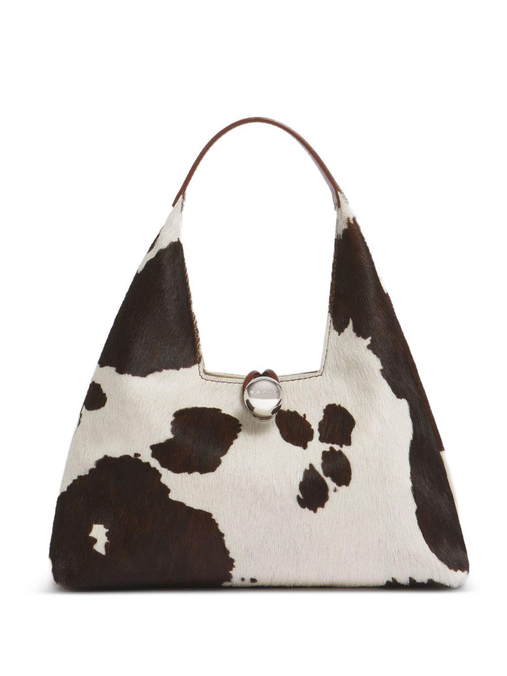 Borsa a spalla con stampa mucca Trapeze in bianco e marrone 