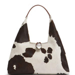 Borsa a spalla con stampa mucca Trapeze in bianco e marrone 