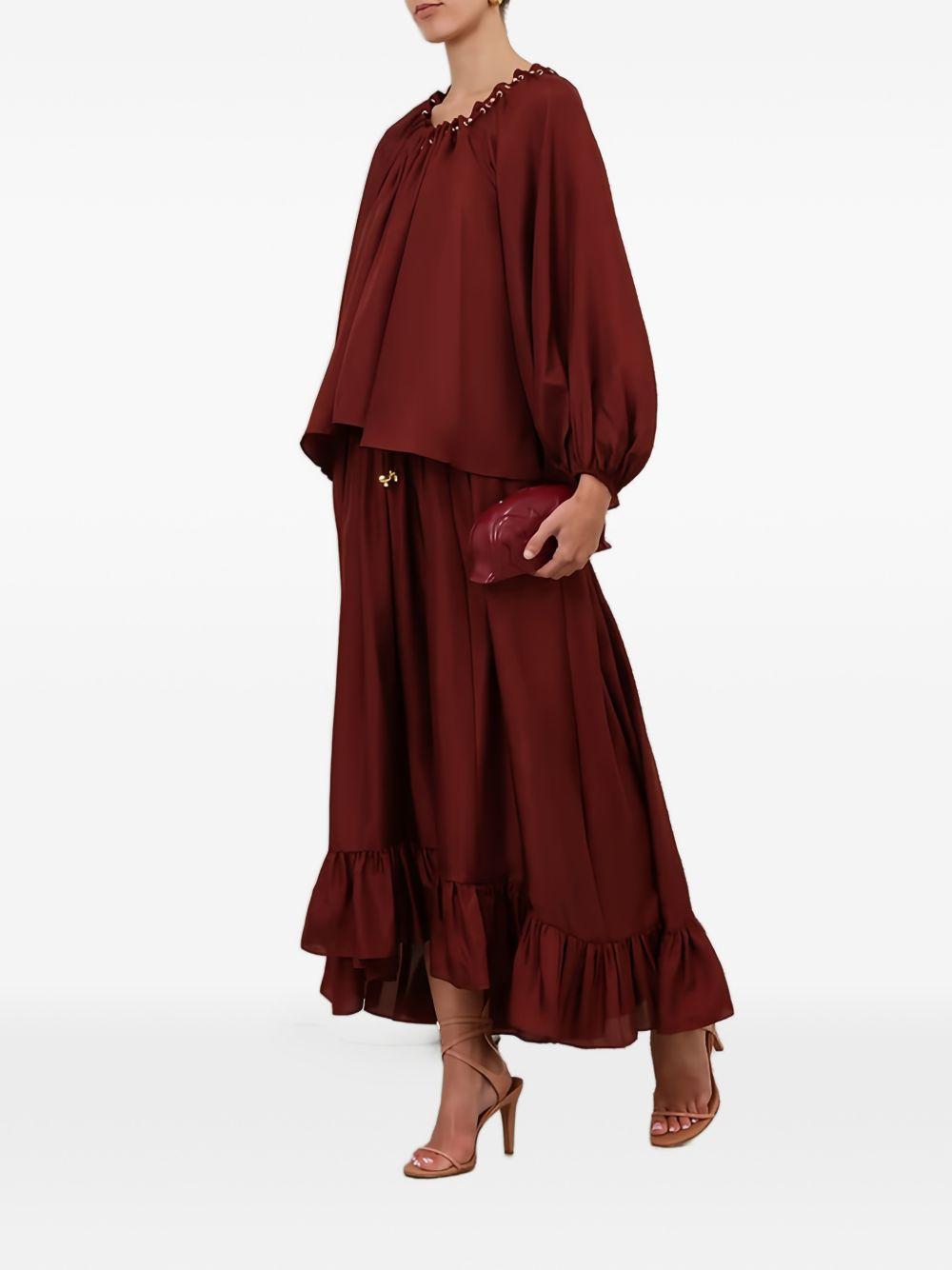 Blusa con decorazioni di perline Aster in bordeaux 