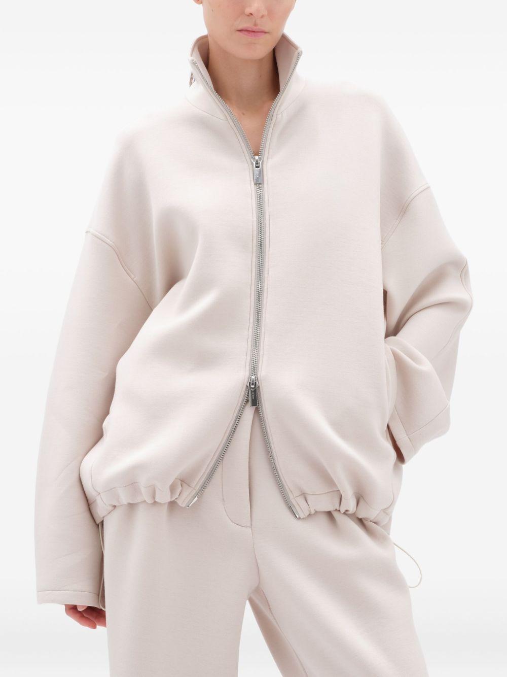 Felpa con zip in grigio ghiaccio Remain - donna 