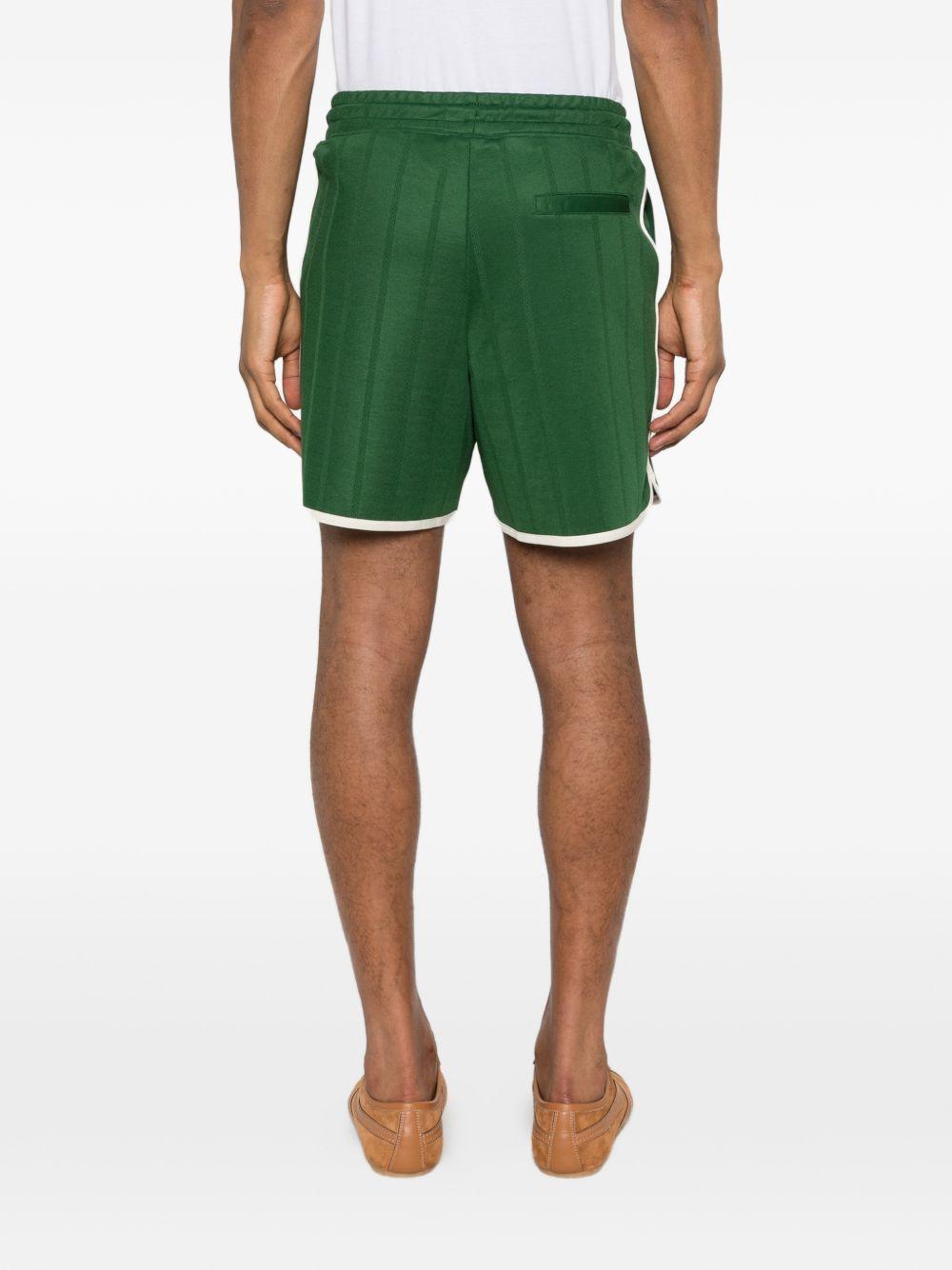 Shorts sportivi con logo in verde Drole de monsieur - uomo 