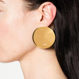 Orecchini rotondi con logo in oro Jil Sander - donna 