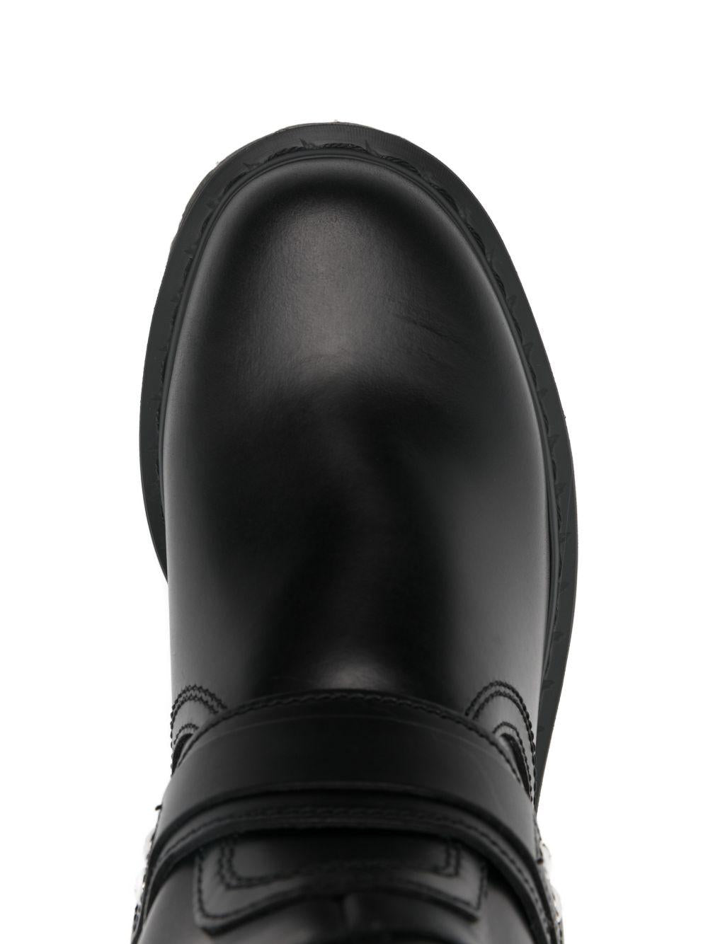 Stivaletti anistone in nero Dr. Martens - uomo 