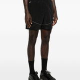 Shorts con cintura in nylon in nero Roa x and wander - uomo 