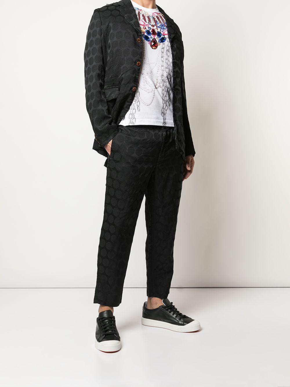 Pantaloni con trama geometrica in nero Comme des Garçons Homme Plus - uomo 