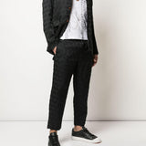 Pantaloni con trama geometrica in nero Comme des Garçons Homme Plus - uomo 
