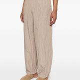 Pantaloni con vita elasticizzata in beige Gongdid design - uomo 